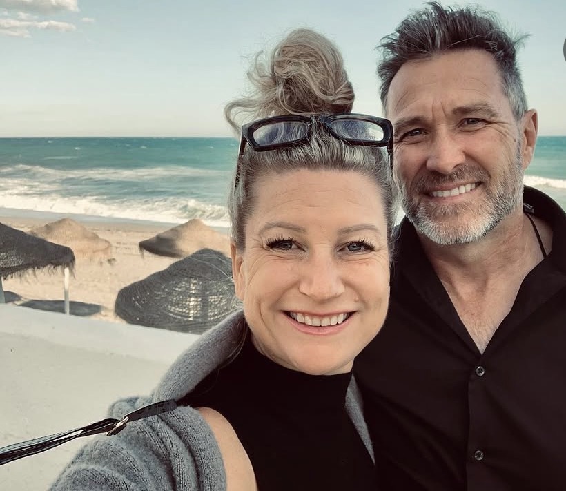 Pam and Sheldon together at the beach.